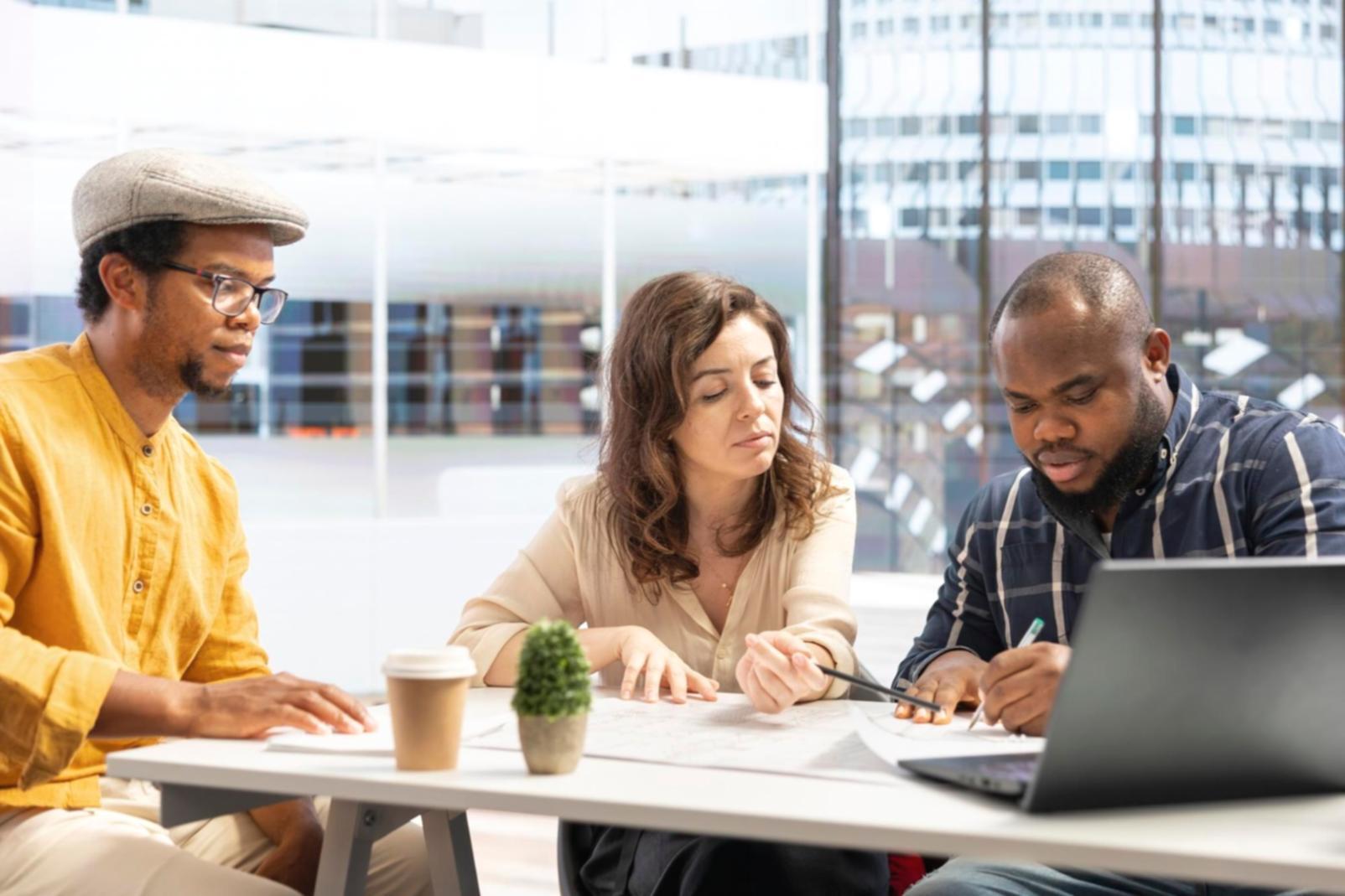 Professional reviewing financial charts and market data