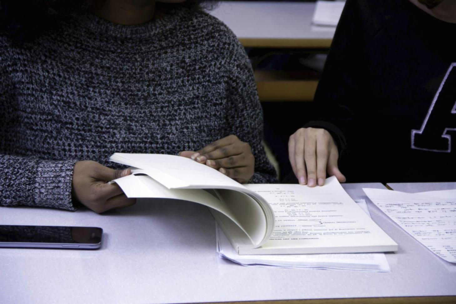 Students collaborating on financial analysis project