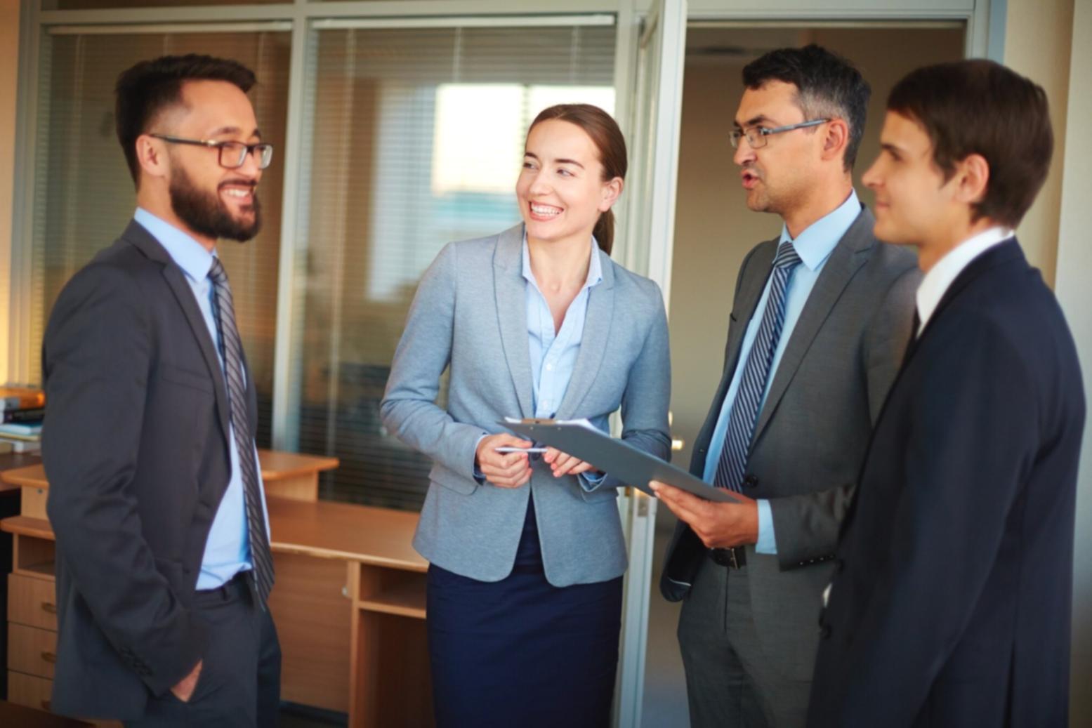 Students analyzing financial documents in classroom setting